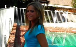 Lovely blonde teen Ashley Abott gives a juicy deepthroat near a pool